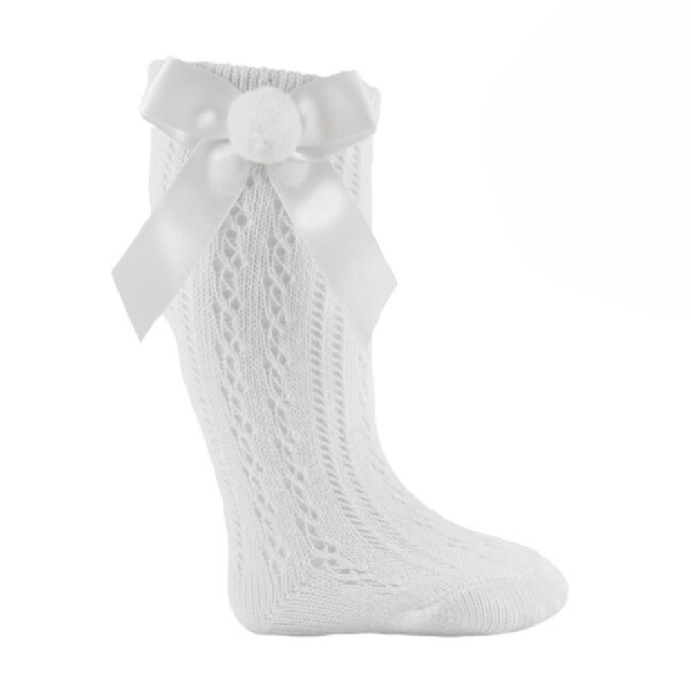 Girls White Knee High Pelerine Pom Pom Bow Socks The Wardrobe