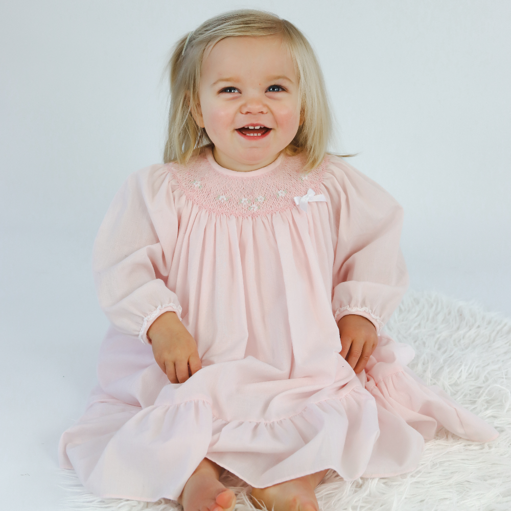 Baby girl long store sleeve smocked dress