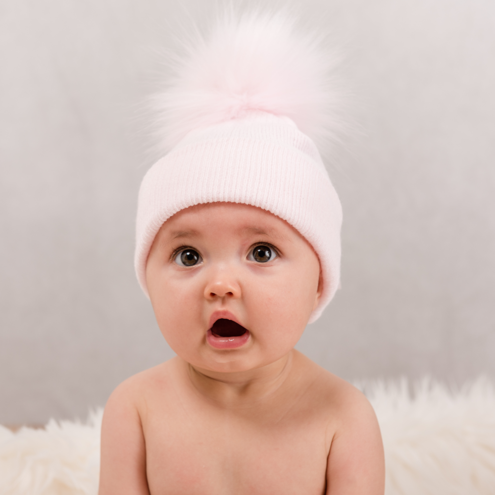 Baby girl pink bobble top hat